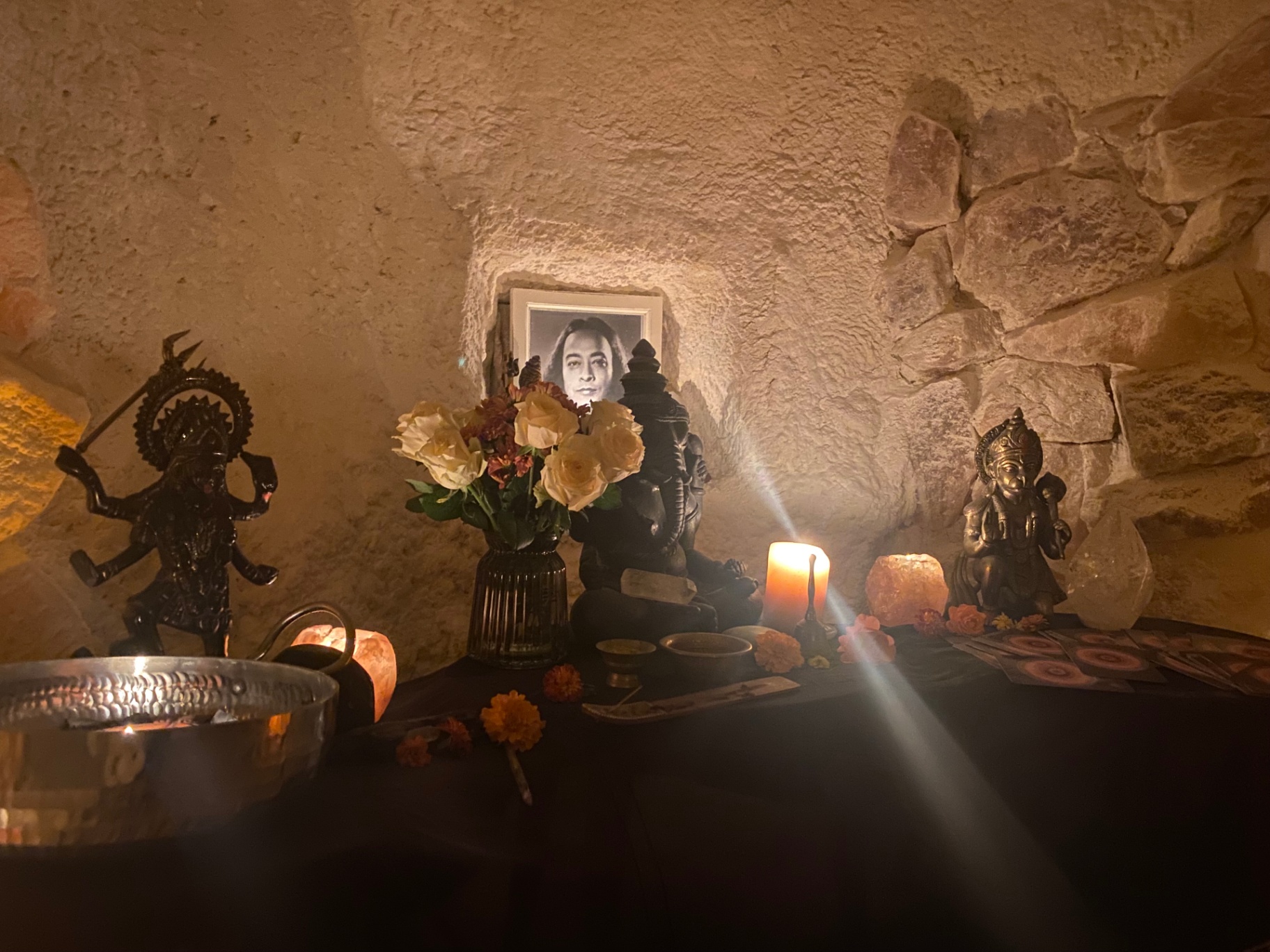 Shrine with flowers and candle
